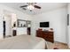 Bright bedroom with ensuite bathroom access at 17540 W Glenhaven Dr, Goodyear, AZ 85338