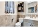 Clean bathroom with updated fixtures and a gray vanity at 18535 W Udall Dr, Surprise, AZ 85374