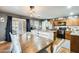 Kitchen with island and dining area at 18535 W Udall Dr, Surprise, AZ 85374