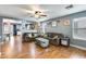 Living room with hardwood floors and open floor plan at 18535 W Udall Dr, Surprise, AZ 85374