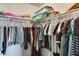Large closet with ample hanging and shelving space at 18535 W Udall Dr, Surprise, AZ 85374
