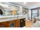 Kitchen with sink, stainless steel appliances, and wood cabinets at 18535 W Udall Dr, Surprise, AZ 85374