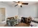 Bright bedroom featuring two beds, a dresser, and plenty of storage at 18535 W Udall Dr, Surprise, AZ 85374