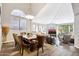 Elegant dining room with large table and chandelier at 514 S Marina Dr, Gilbert, AZ 85233