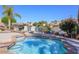 Community spa with lounge chairs overlooking a lake at 514 S Marina Dr, Gilbert, AZ 85233