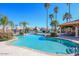 Community pool with a covered patio and lake views at 514 S Marina Dr, Gilbert, AZ 85233