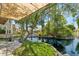 Patio area with canal view and shade structure at 514 S Marina Dr, Gilbert, AZ 85233