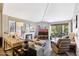 Bright living room with fireplace and large TV at 514 S Marina Dr, Gilbert, AZ 85233