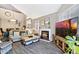 Spacious living room with fireplace and hardwood floors at 514 S Marina Dr, Gilbert, AZ 85233