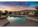 Inviting pool and patio with plenty of space for entertaining at 21151 E Mewes Rd, Queen Creek, AZ 85142