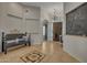 Welcoming entryway with a tiled floor, a chalkboard wall, and a cozy bench at 21151 E Mewes Rd, Queen Creek, AZ 85142