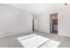 Bright bedroom with carpeted floor and natural light at 9239 E Spiral Ave, Mesa, AZ 85212