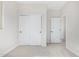 Bright bedroom with double door closet and carpet at 9239 E Spiral Ave, Mesa, AZ 85212