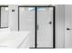 Clean bathroom with a glass shower and white fixtures at 9239 E Spiral Ave, Mesa, AZ 85212