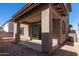 Covered patio with view of backyard and block wall at 9239 E Spiral Ave, Mesa, AZ 85212