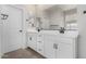 Elegant bathroom with double vanity and modern fixtures at 9239 E Spiral Ave, Mesa, AZ 85212