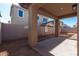 Covered patio with view of backyard and block wall at 9239 E Spiral Ave, Mesa, AZ 85212