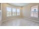 Bright dining room with tile floors and plantation shutters at 26562 W Vista North Dr, Buckeye, AZ 85396