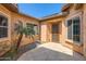 Charming courtyard entry with a stone-paved floor at 26562 W Vista North Dr, Buckeye, AZ 85396