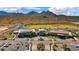 Aerial view of community amenities including clubhouse and golf course at 26562 W Vista North Dr, Buckeye, AZ 85396