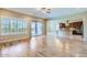 Open living room with hardwood floors and kitchen views at 26562 W Vista North Dr, Buckeye, AZ 85396