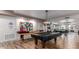 Community game room with shuffleboard and pool table at 2511 W Queen Creek Rd # 425, Chandler, AZ 85248
