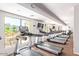 Modern fitness center with a variety of cardio equipment at 2511 W Queen Creek Rd # 425, Chandler, AZ 85248