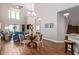 Bright dining area with glass table and four chairs at 2511 W Queen Creek Rd # 425, Chandler, AZ 85248