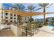 Outdoor kitchen with grill and seating area, perfect for entertaining at 2511 W Queen Creek Rd # 425, Chandler, AZ 85248