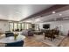 Spacious community room with comfortable seating and a large TV at 2511 W Queen Creek Rd # 425, Chandler, AZ 85248