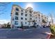 Three-story building with parking and landscaped grounds at 2511 W Queen Creek Rd # 425, Chandler, AZ 85248
