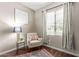 Cozy office or sitting area with wood floors and a comfortable chair at 2511 W Queen Creek Rd # 425, Chandler, AZ 85248
