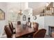 Formal dining room featuring a large table and chandelier at 1201 W Washington Ave, Gilbert, AZ 85233
