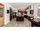 Spacious kitchen featuring granite countertops, stainless steel appliances, and ample cabinetry at 1201 W Washington Ave, Gilbert, AZ 85233