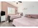 Bright bedroom with two beds and neutral decor at 1201 W Washington Ave, Gilbert, AZ 85233