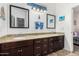 Bathroom with double vanity and granite countertops at 1201 W Washington Ave, Gilbert, AZ 85233