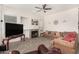 Cozy Gathering room with fireplace and large TV at 1201 W Washington Ave, Gilbert, AZ 85233