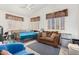 Multipurpose room with sofa, bed, and window seat at 1201 W Washington Ave, Gilbert, AZ 85233