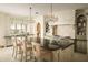 Bright kitchen, granite island, and high-end appliances at 10947 E Wingspan Way, Scottsdale, AZ 85255