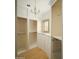 Large walk-in closet with ample shelving and hanging space at 10947 E Wingspan Way, Scottsdale, AZ 85255