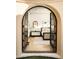 Spacious bedroom with light wood floors and access to a private balcony at 10947 E Wingspan Way, Scottsdale, AZ 85255