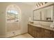 Bathroom with a walk-in shower, granite countertop, and mountain views at 10947 E Wingspan Way, Scottsdale, AZ 85255