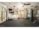 Home gym with a cardio machine and a Cryosauna at 10947 E Wingspan Way, Scottsdale, AZ 85255
