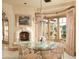 Charming breakfast nook with fireplace and bay window at 10947 E Wingspan Way, Scottsdale, AZ 85255