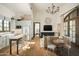 Charming kitchenette with white cabinets and a center island at 10947 E Wingspan Way, Scottsdale, AZ 85255