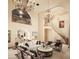 Two-story living room with fireplace and balcony at 10947 E Wingspan Way, Scottsdale, AZ 85255
