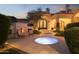 Relaxing hot tub with fire pit, outdoor seating, and views of the mountains at 10947 E Wingspan Way, Scottsdale, AZ 85255