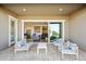 Covered patio with view into the living room at 5549 S Del Rancho --, Mesa, AZ 85212