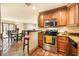 Kitchen features stainless steel appliances and granite countertops at 8638 E Paraiso Dr, Scottsdale, AZ 85255