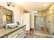 Bathroom features a large walk-in shower and granite vanity at 8638 E Paraiso Dr, Scottsdale, AZ 85255